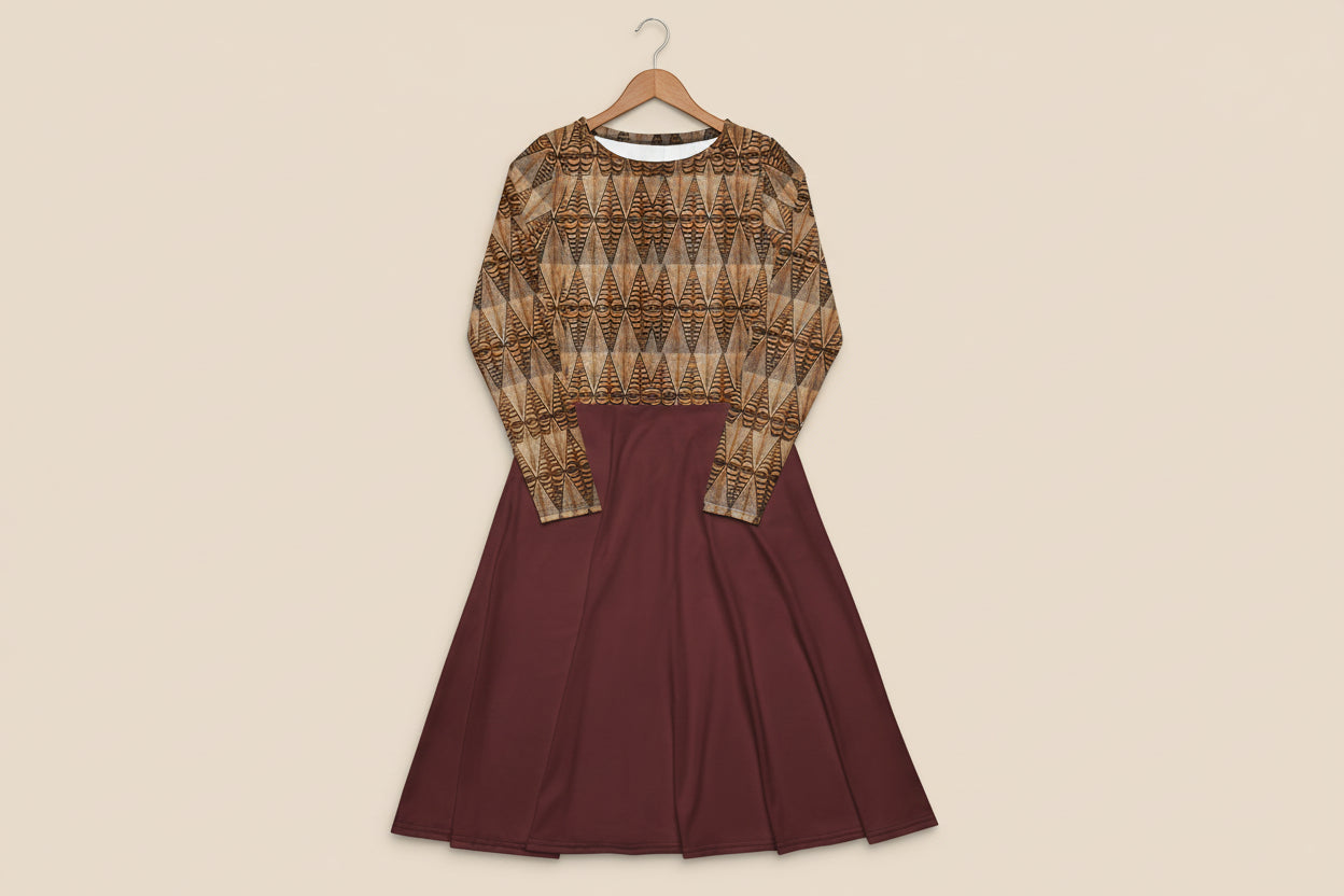 Two-piece outfit with patterned top and solid maroon skirt on a white background