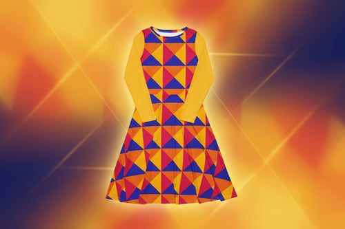 Colorful geometric patterned dress with yellow sleeves on a white background